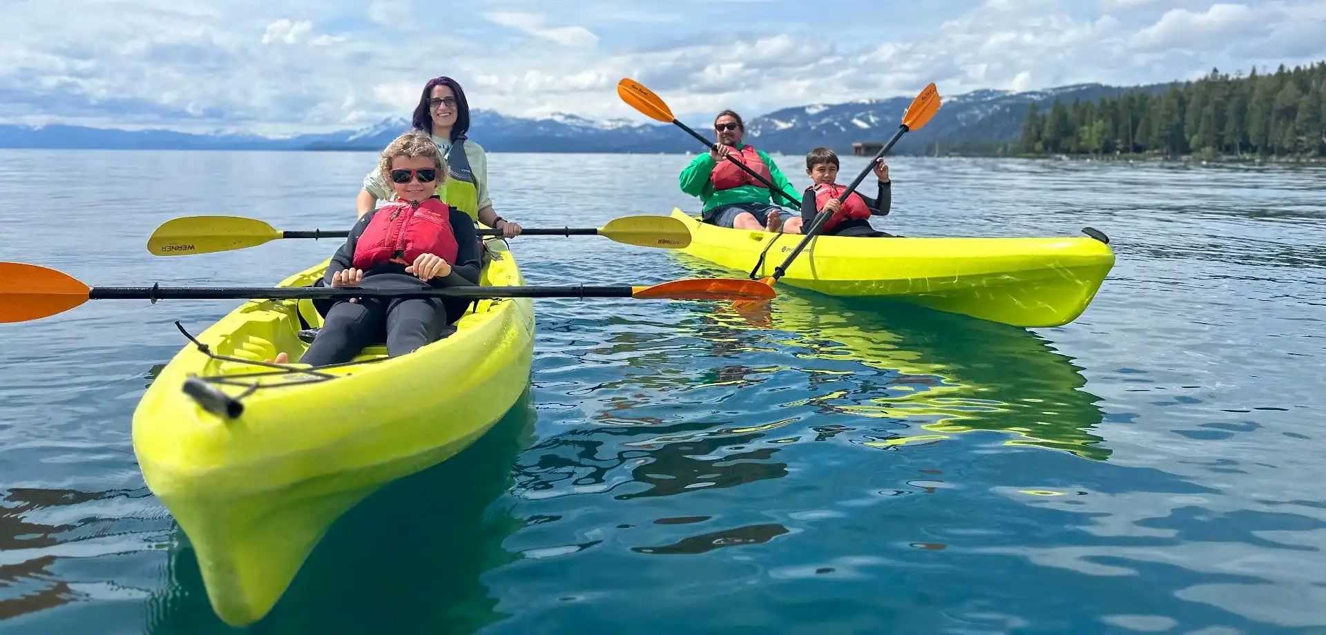 family kayaking on Lake Tahoe